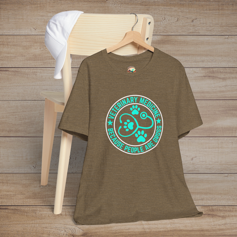 Heather olive t-shirt featuring a turquoise circular design with paw prints and a stethoscope, plus the phrase “Veterinary Medicine Because People Are Gross”