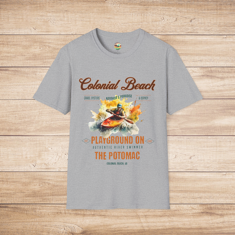 Sport Grey Colonial Beach Soft Fit T-Shirt featuring a colorful kayaking graphic, laid flat on wooden surface to highlight the beach and river adventure design