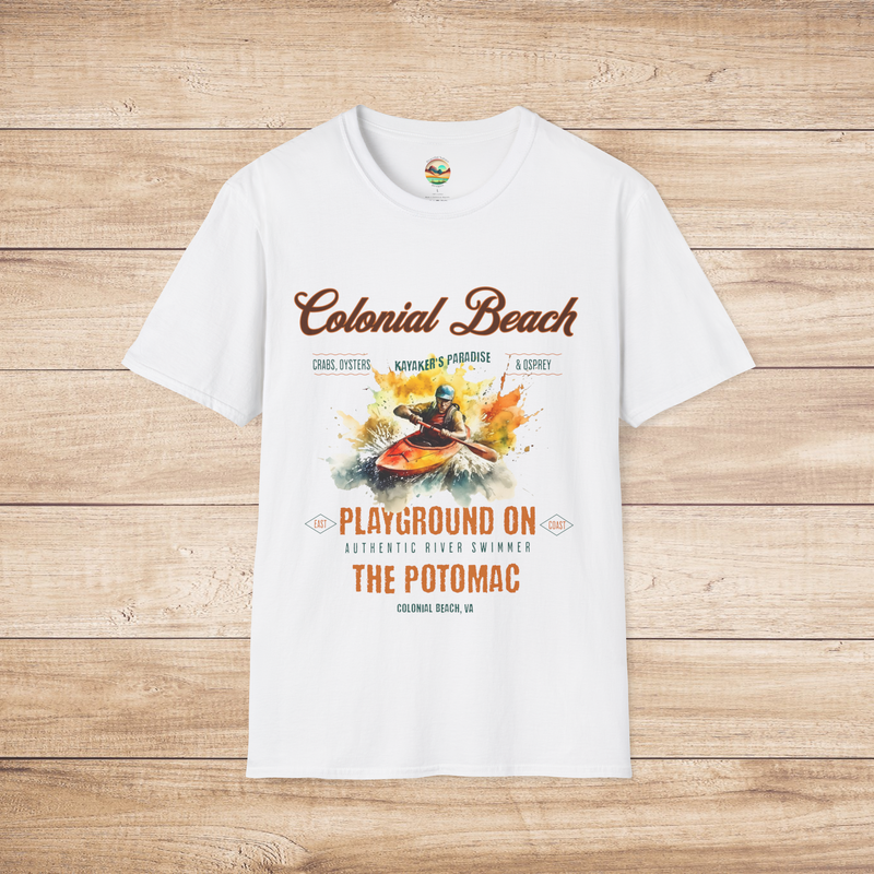 White Colonial Beach Soft Fit T-Shirt with colorful Potomac River kayaking illustration, laid flat on rustic wood background, capturing coastal charm and outdoor fun