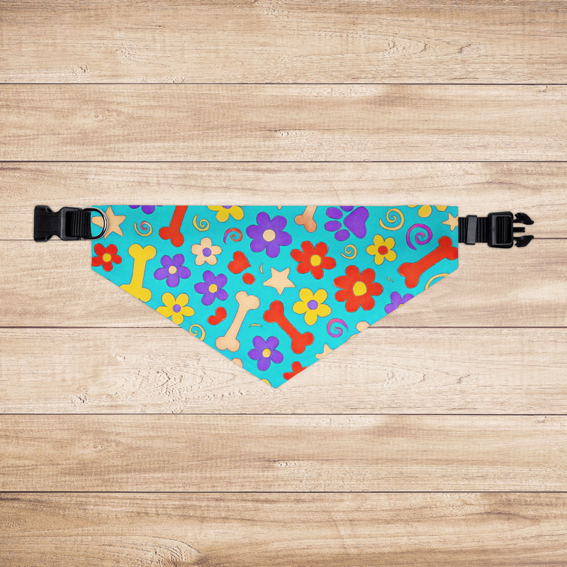 Extra-large dog bandana laid flat on wood surface showing full colorful