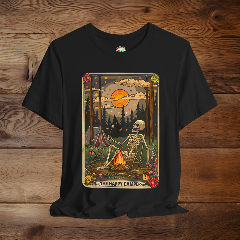 Black Happy Camper Tarot T-Shirt featuring a relaxed skeleton roasting marshmallows by a campfire in a mystical forest