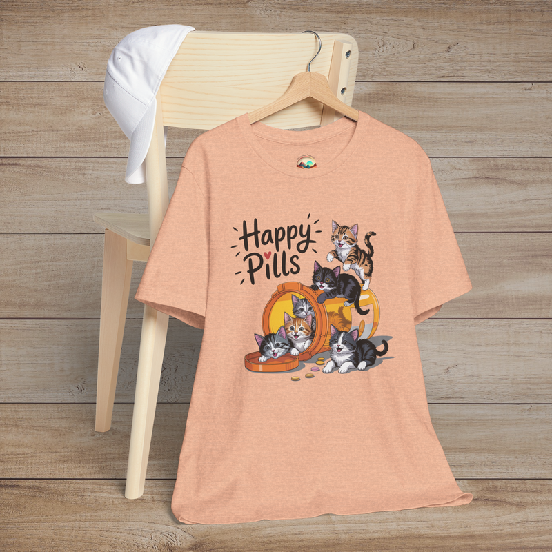Happy Pills kitten t-shirt on heather peach fabric with cute cartoon kittens playing around an orange pill bottle