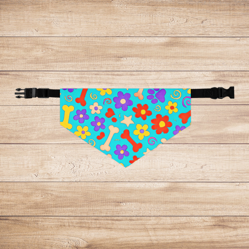 Flat-lay of large dog bandana with vivid bone and flower pattern