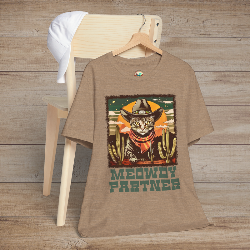 Heather Tan Meowdy Partner Western Cat Tee depicting a fun cat in cowboy gear, accented by desert cacti and retro Wild West graphics