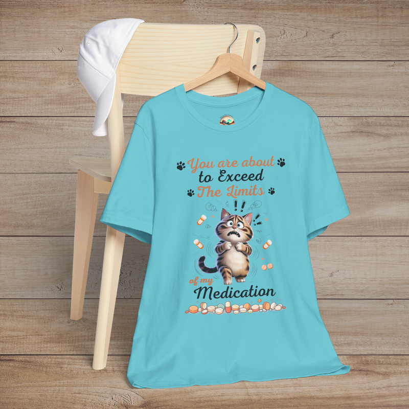 Funny turquoise t-shirt with a cat graphic and text on a wooden background