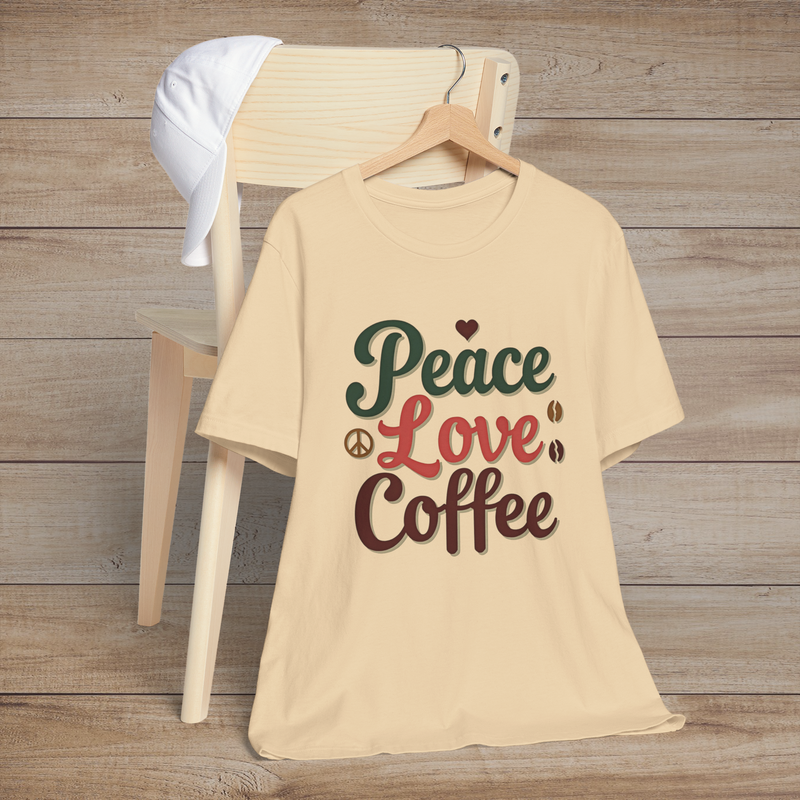 ☕ Peace. Love. Coffee. – Premium Retro Graphic Tee for Caffeine Enthusiasts Soft Cream