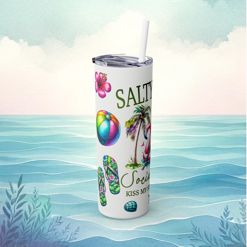 Left side of the white Salty Bitch tumbler design showing floral flip flops, rainbow beach ball, hibiscus, and tropical palm accents