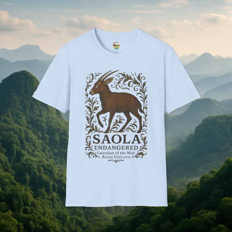 Saola Endangered Asian Unicorn T-Shirt in Light Blue – Showcasing a rare Saola design surrounded by elegant foliage. Eco-friendly soft cotton shirt photographed with misty mountains in the background