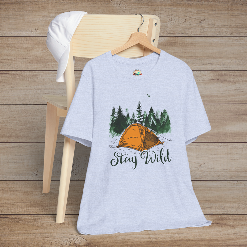 Heather blue Stay Wild Camper T-Shirt featuring an orange tent, evergreen trees, and birds with "Stay Wild" text