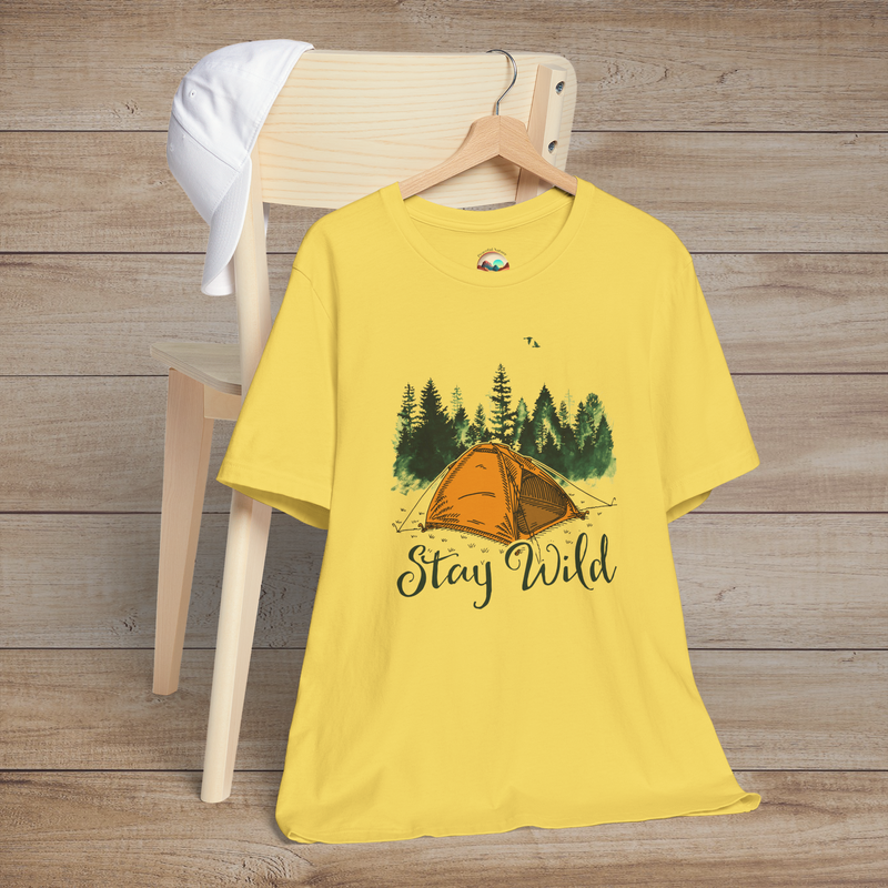 Maize yellow Stay Wild Camper T-Shirt with a nature scene of an orange tent, pine trees, and a "Stay Wild" slogan