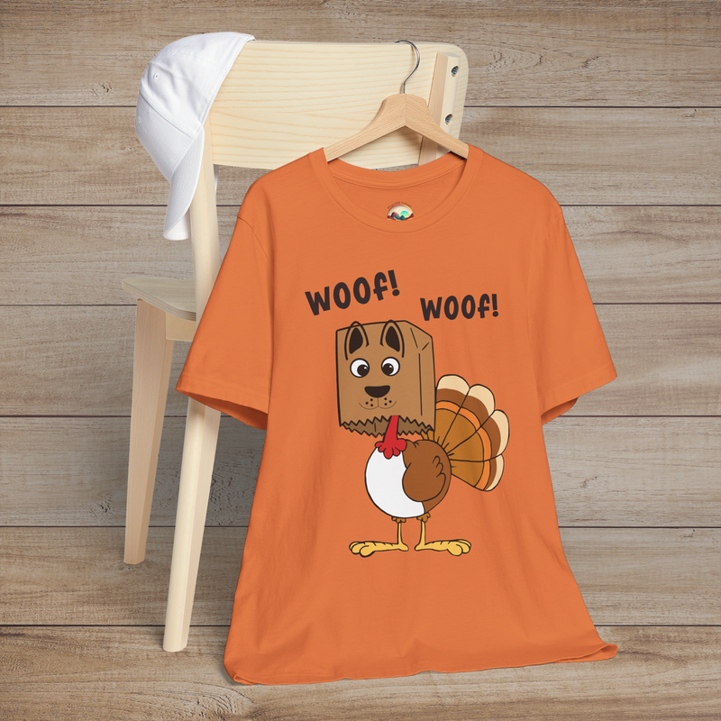 Funny Thanksgiving shirt with a turkey wearing a dog mask saying “Woof! Woof!” on burnt orange tee