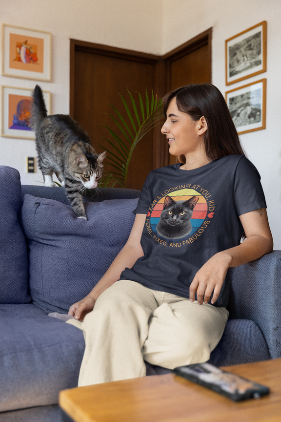 Woman wearing navy blue Ear’s Looking at You Kid TNR cat shirt with retro ear-tipped black cat design, Bella Canvas 3001
