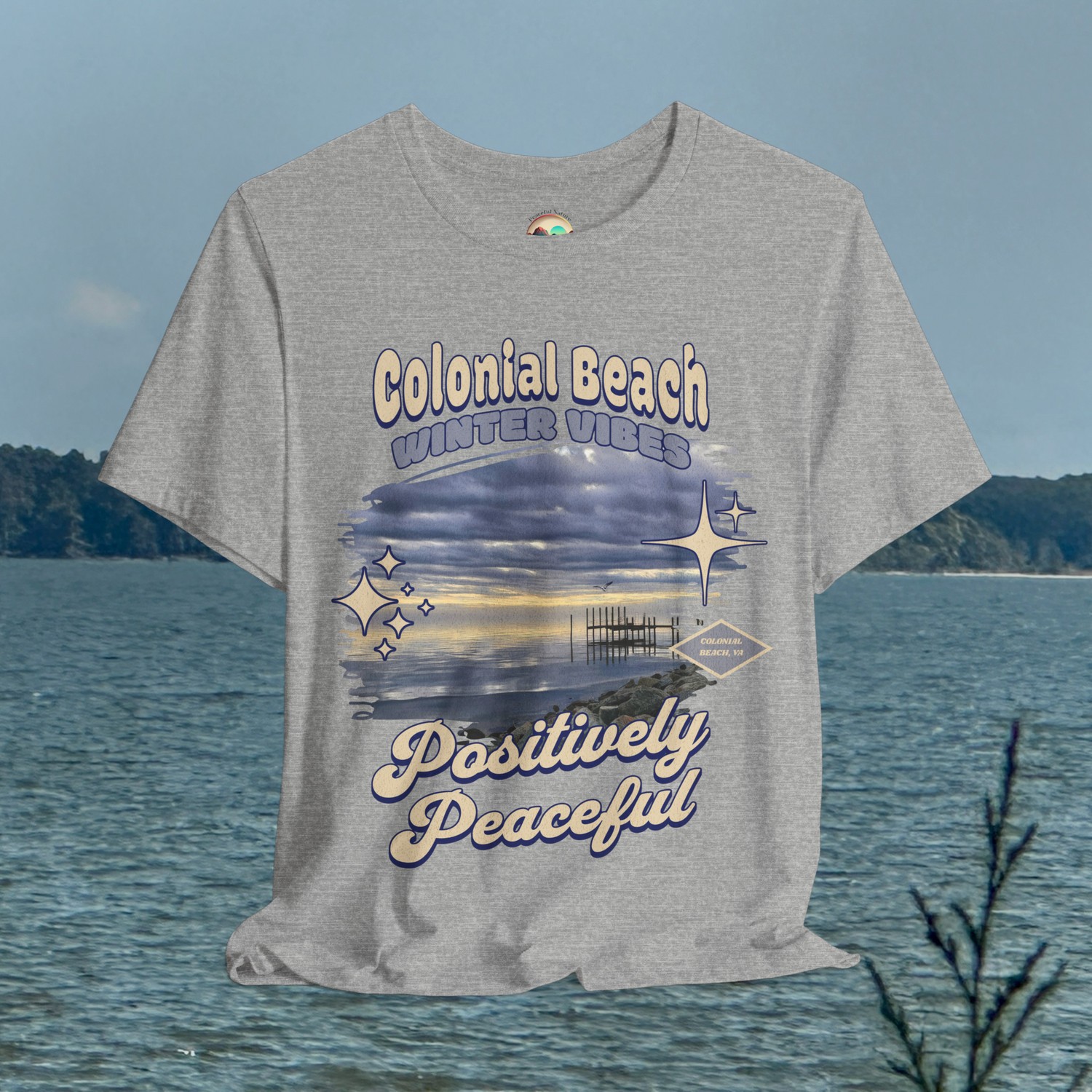 colonial beach winter vibes heather grey premium t-shirt hanging by the water
