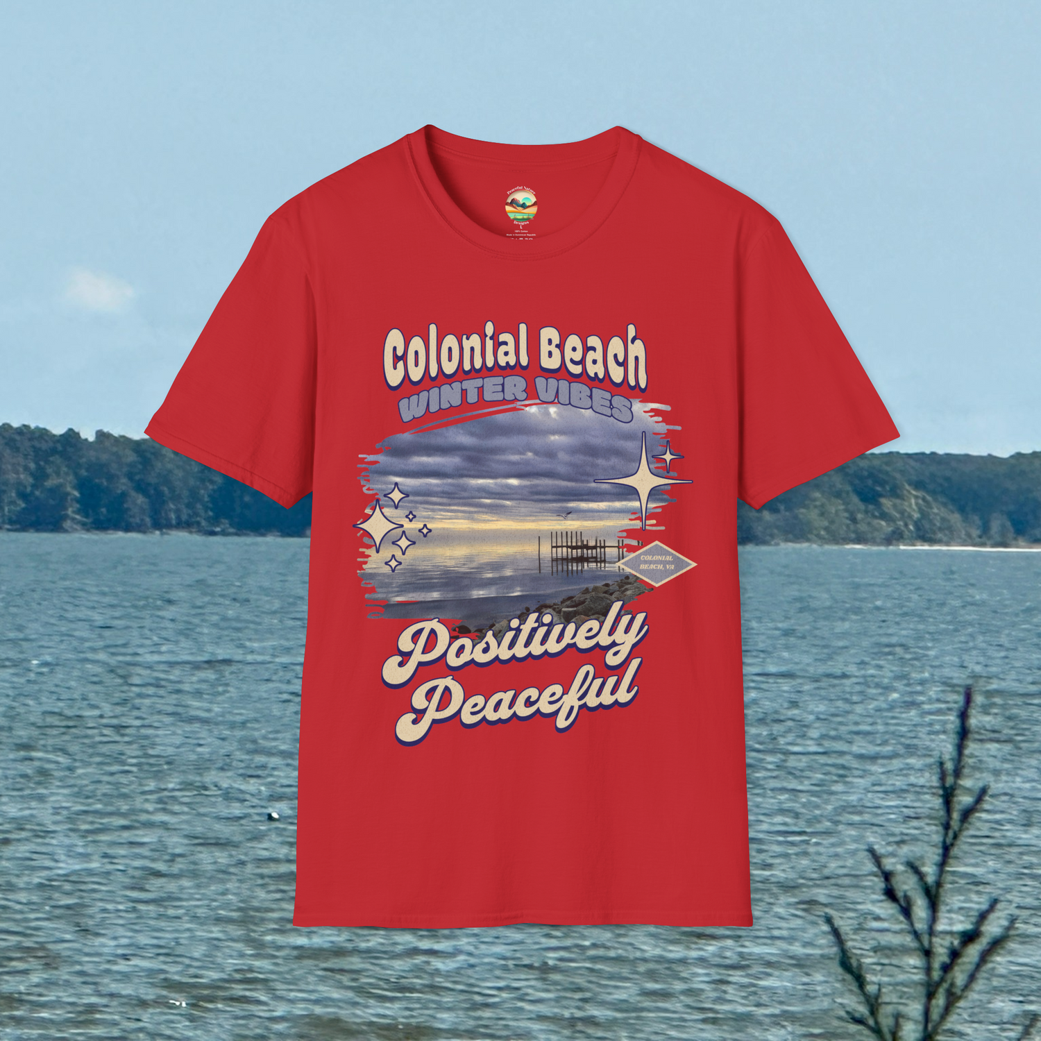 Colonial Beach Winter Vibes Soft Fit T-Shirt in Red, displayed hanging outdoors near coastal water