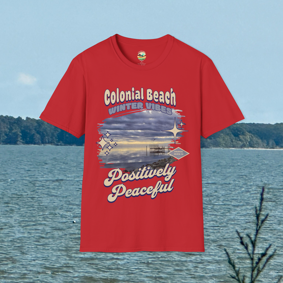 Colonial Beach Winter Vibes Soft Fit T-Shirt in Red, displayed hanging outdoors near coastal water