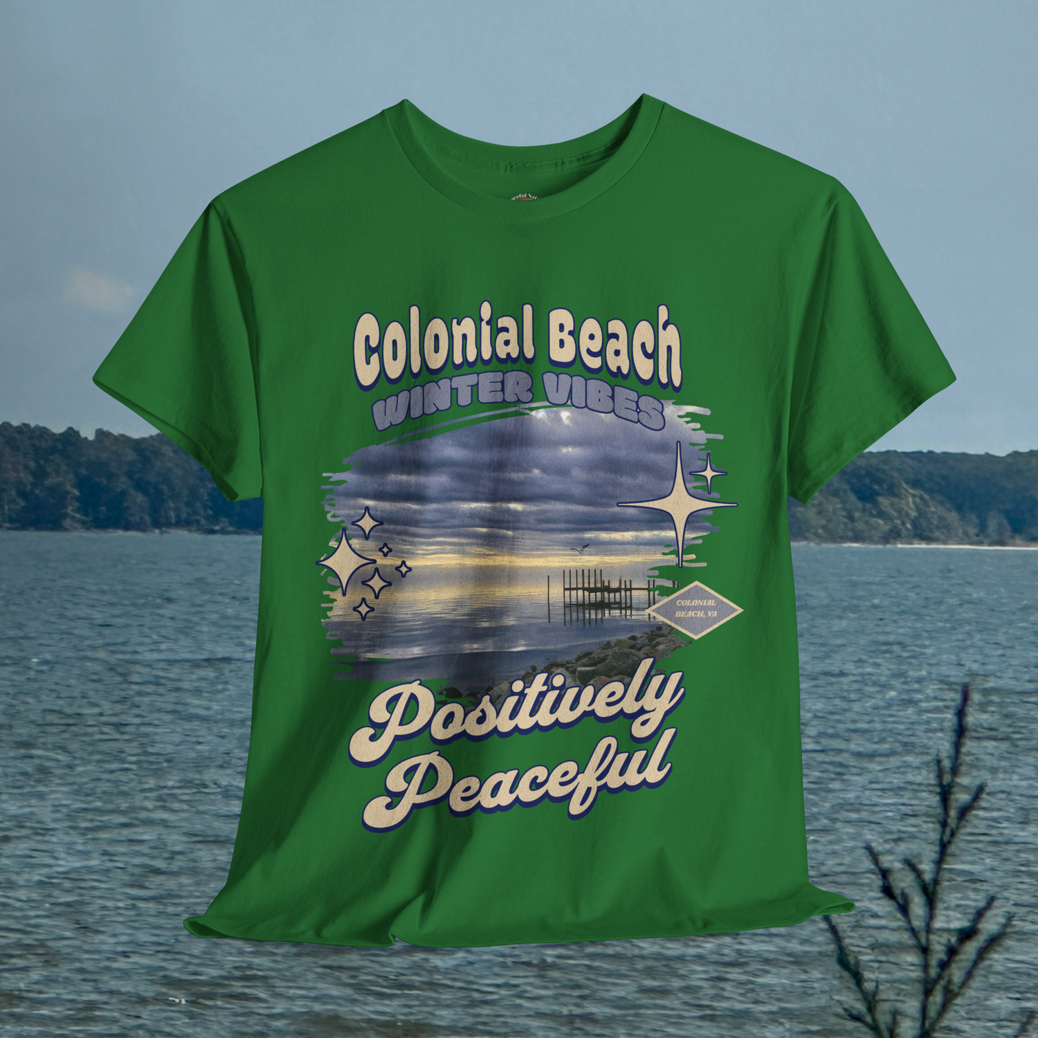 Colonial Beach Winter Vibes turf green t-shirt hanging with a scenic water view