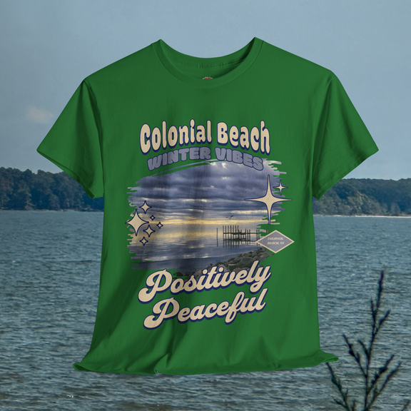 Colonial Beach Winter Vibes turf green t-shirt hanging with a scenic water view
