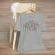 Athletic Grey Retro Nurse T-Shirt with vibrant flowers and colorful vintage typography