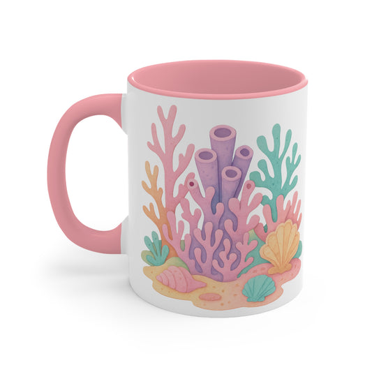 Coral Reef Mug Left Side - 11oz featuring pastel corals and seashells in a vibrant reef design on a white ceramic mug with pink handle and interior.