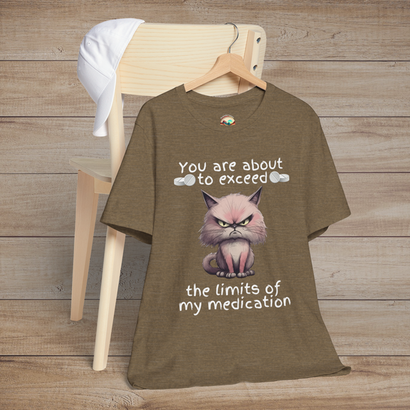Heather olive funny cranky cat t-shirt featuring sarcastic angry cartoon cat and medication limits quote, laid flat for casual cat lover fashion