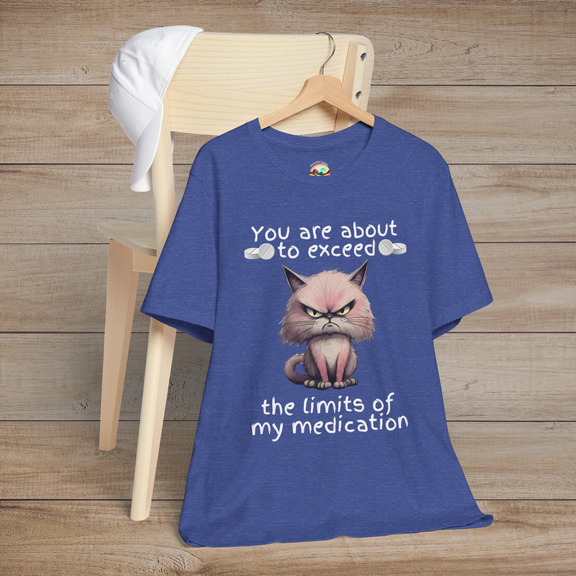 Heather royal blue cranky cat t-shirt with grumpy cartoon cat graphic and sarcastic medication humor quote, laid flat, ideal for cat lovers and humor fans