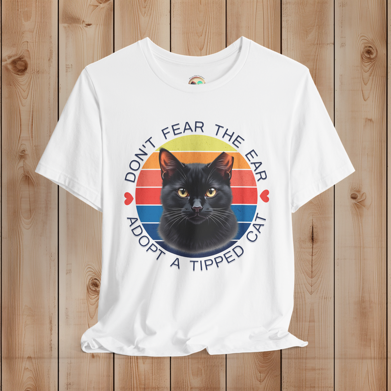 White Bella Canvas t-shirt with retro black cat “Adopt a Tipped Cat” design promoting TNR