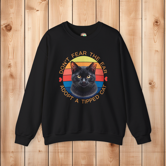Black Bella Gildan 18000 sweatshirt, featuring black cat ear-tipped TNR design with retro sunset background.