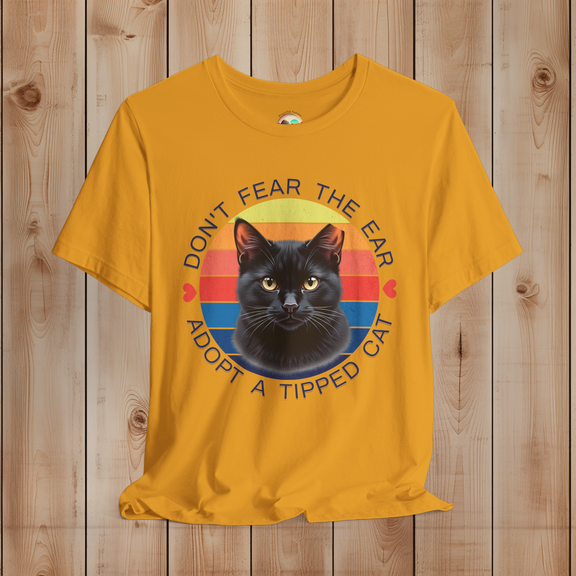 Mustard yellow Bella Canvas tee with retro “Don’t Fear the Ear” black cat TNR rescue artwork