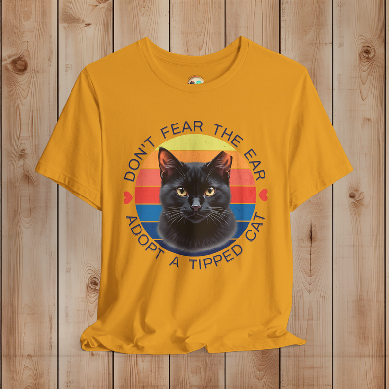 Mustard yellow Bella Canvas tee with retro “Don’t Fear the Ear” black cat TNR rescue artwork