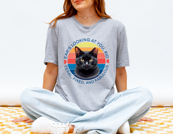 Woman wearing grey (athletic heather) Ear’s Looking at You Kid TNR cat shirt with retro ear-tipped black cat design, Bella Canvas 3001