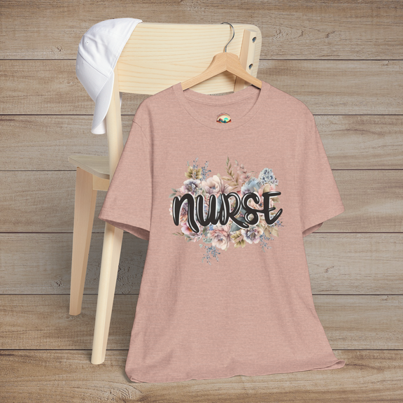 Heather prism peach Nurse Floral Premium Fit T-Shirt displayed beautifully on hanger, adorned with gentle pastel florals and scripted "Nurse"