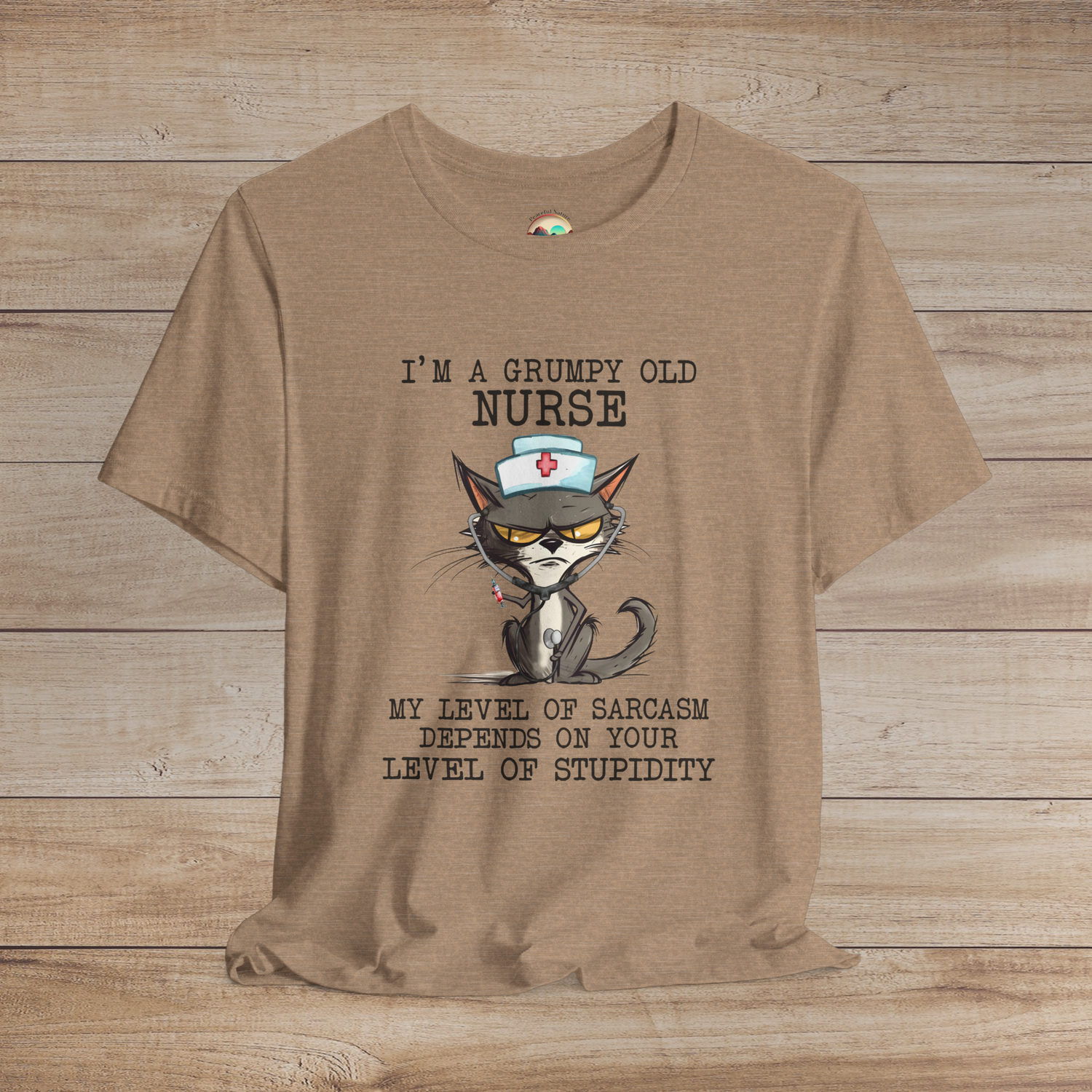 Grumpy old nurse cat t-shirt with sarcastic quote, wearing a nurse hat and stethoscope, printed on soft heather tan premium cotton