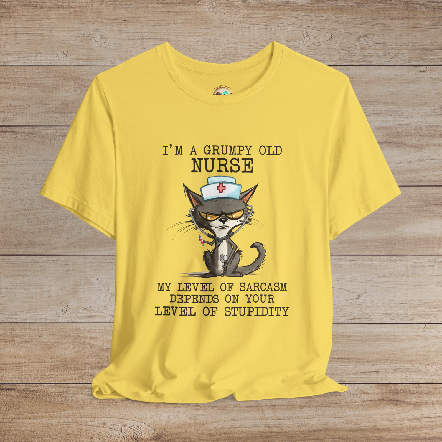 Funny nurse t-shirt with cranky cat illustration and witty quote about sarcasm, premium maize yellow cotton tee