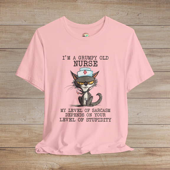 Cute but sarcastic nurse cat t-shirt, featuring a cranky cat in nurse hat and stethoscope, premium soft pink cotton fabric