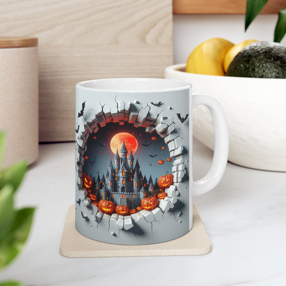 Front view of the 11 oz Halloween Mischief Mug placed in a bright kitchen, displaying a vivid Halloween castle surrounded by flying bats and carved pumpkins bursting through a cracked stone wall. A spooky and fun seasonal mug