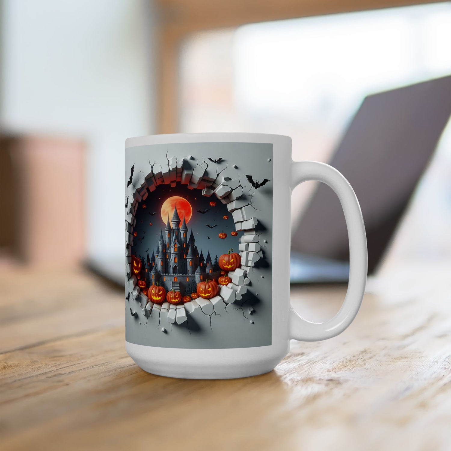 Right-side view of the 15 oz Halloween Mischief Mug in a warm workspace setting. Highlights a full moon, dark gothic castle, and pumpkin scene inside a 3D crumbling wall print. Perfect for larger Halloween-themed coffee breaks
