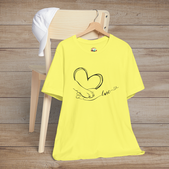 Yellow t-shirt with delicate minimalist design showing a hand and paw forming a heart shape with love written in flowing script
