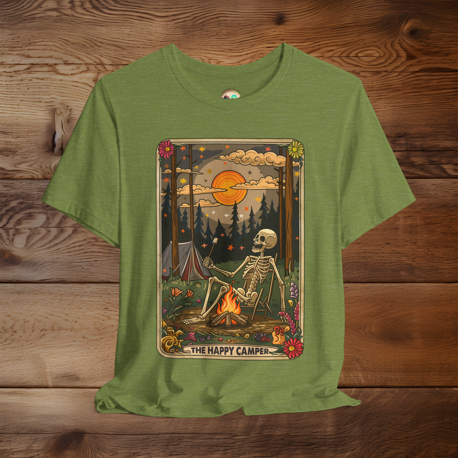 Heather Green Happy Camper Tarot T-Shirt with a vintage tarot card-style skeleton camping design