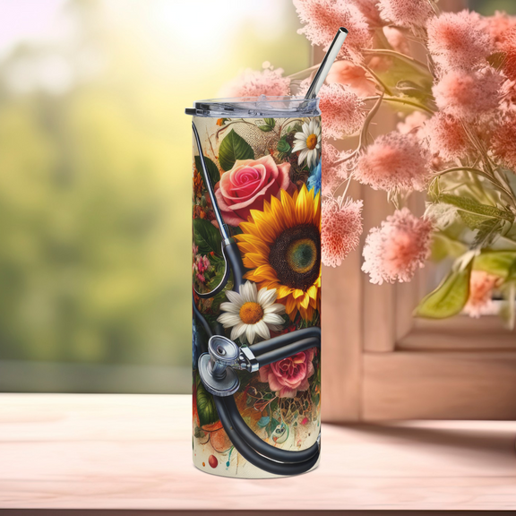 Front view of Healing in Full Bloom 20oz stainless steel tumbler featuring vibrant sunflowers, roses, and daisies with a stethoscope design – floral medical and veterinary gift by Peaceful Nature Designs.