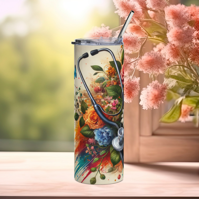 Left side of Healing in Full Bloom 20oz stainless steel tumbler showcasing colorful watercolor florals and stethoscope art – durable glossy tumbler for nurses, doctors, and vet techs