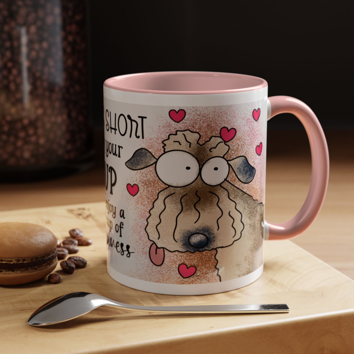Right-side view of the 11 oz Hug Your Pup Mug featuring a playful cartoon dog illustration, pink trim and handle, surrounded by charming red hearts and the joyful quote 'Life is short, Hug your PUP and enjoy a nice cup of happiness.' Perfect gift for dog lovers