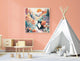 May include: A framed watercolor painting of a black and white cat sitting in a colorful landscape with a sunset. The painting hangs on a peach-colored wall in a child's room, next to a white teepee tent.