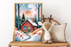 May include: Watercolor painting of a red cabin in a snowy forest scene, framed in wood. A plush deer with antlers and a decorative pillow sit on a wooden chair. The painting features a sunset and a path leading to the cabin.