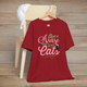 Canvas red t-shirt with pink and green script Just a Nurse Who Loves Cats featuring a playful black cat wearing a nurse cap