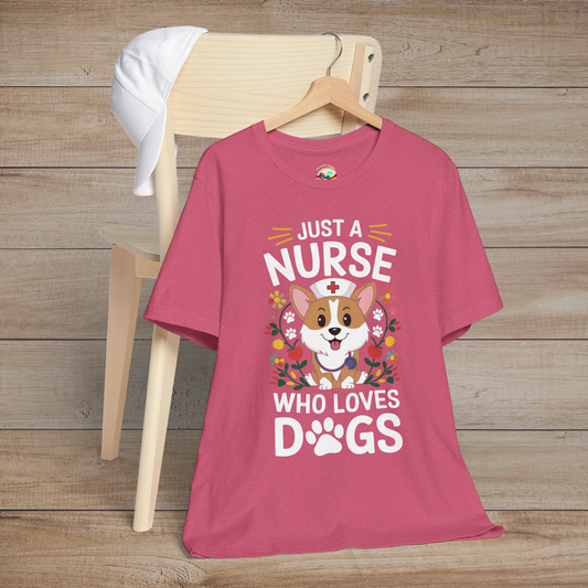Heather raspberry t-shirt with cute dog illustration and floral accents, reading Just a Nurse Who Loves Dogs in playful white font