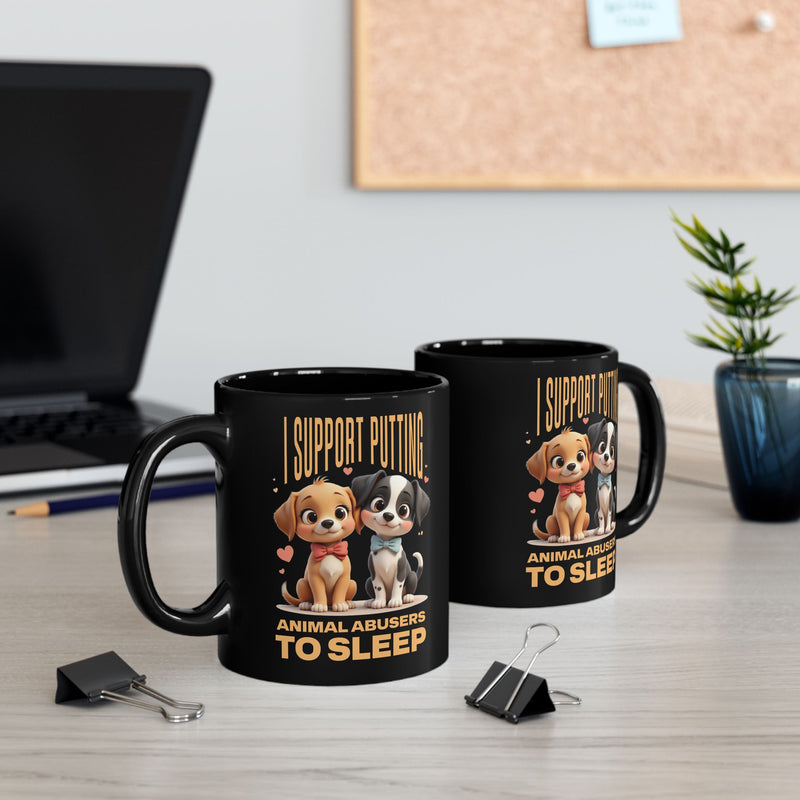 Desk scene with black 11oz mugs featuring Pixar-style puppies and bold anti-animal-abuse slogan – left and right view