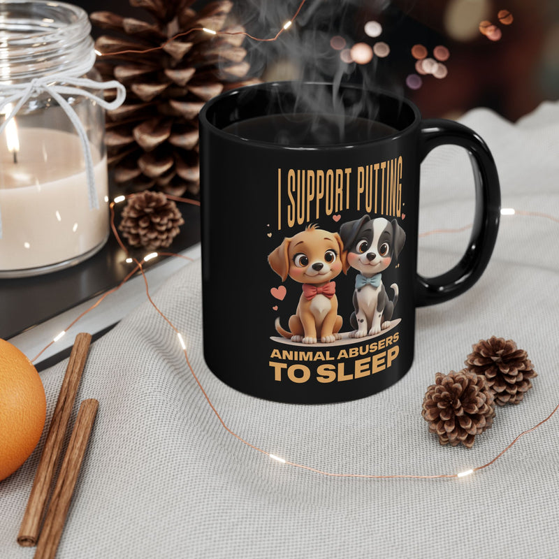 Holiday table scene with black 11oz mug featuring Pixar-style puppies and “I Support Putting Animal Abusers to Sleep” – right view