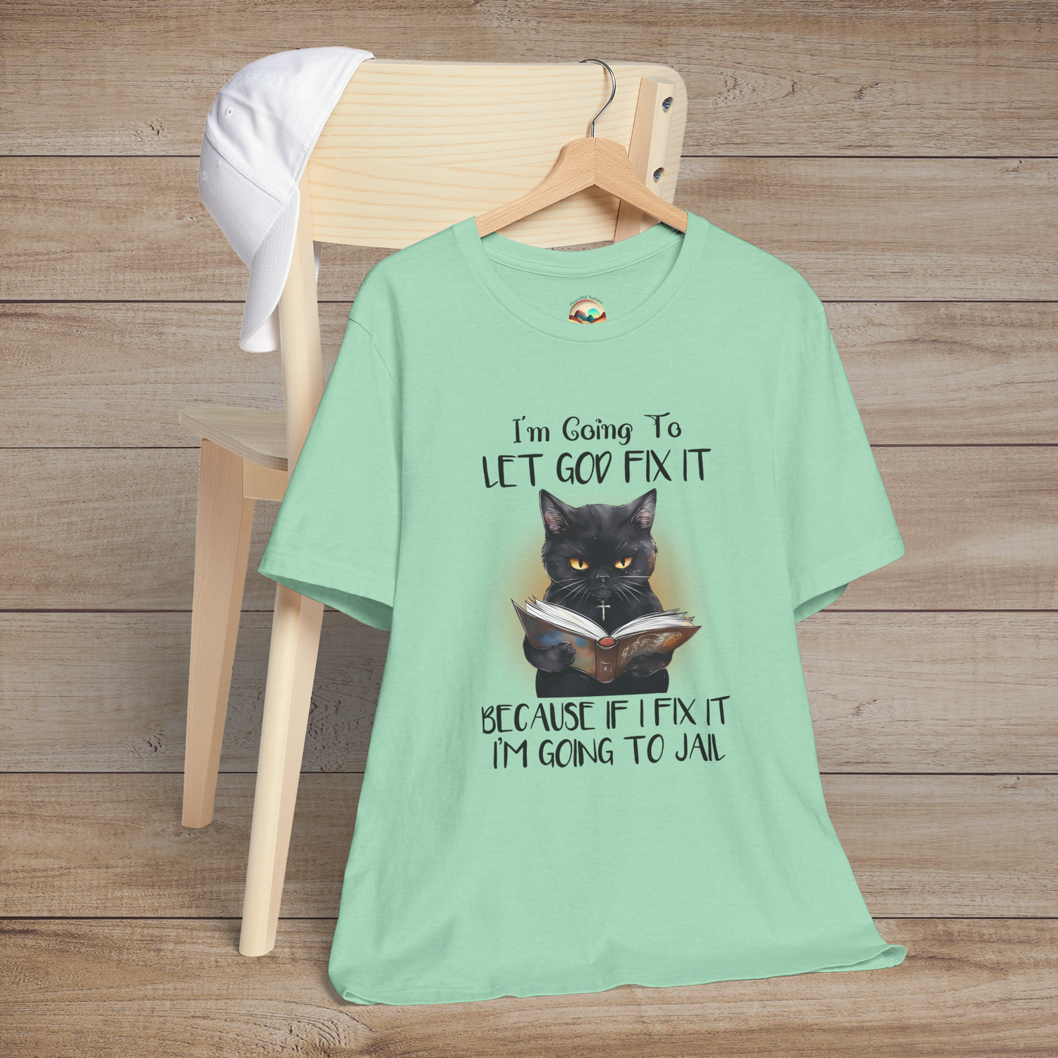 Heather mint Let God Fix It T-Shirt featuring a black cat and funny saying about faith patience and letting God fix it