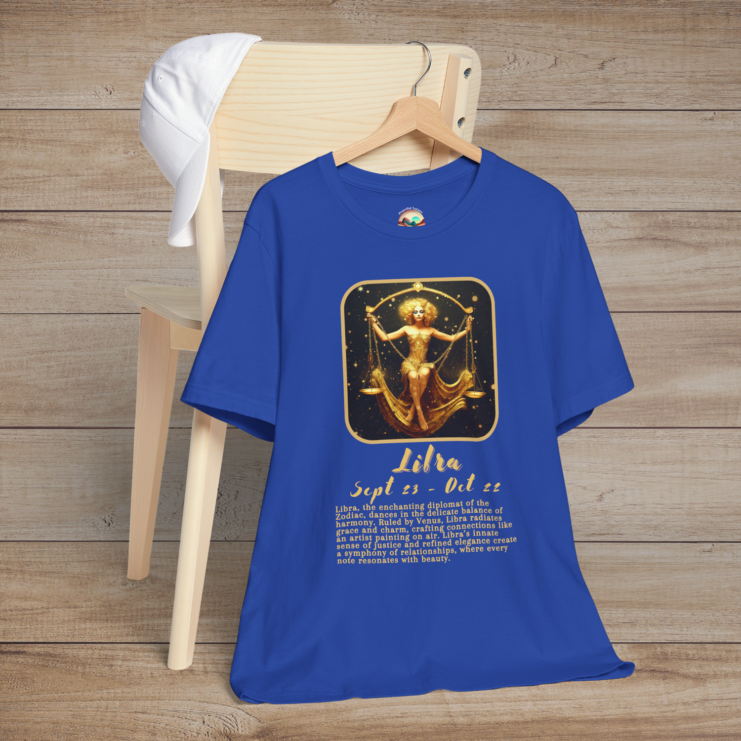 Royal blue Libra Zodiac T-Shirt with a gleaming gold scales emblem celebrating fairness and charm