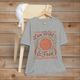 Live Wild & Free Boho Mandala Feather T-Shirt in heather grey – bohemian style graphic tee with earthy mandala and feather artwork, soft lightweight cotton